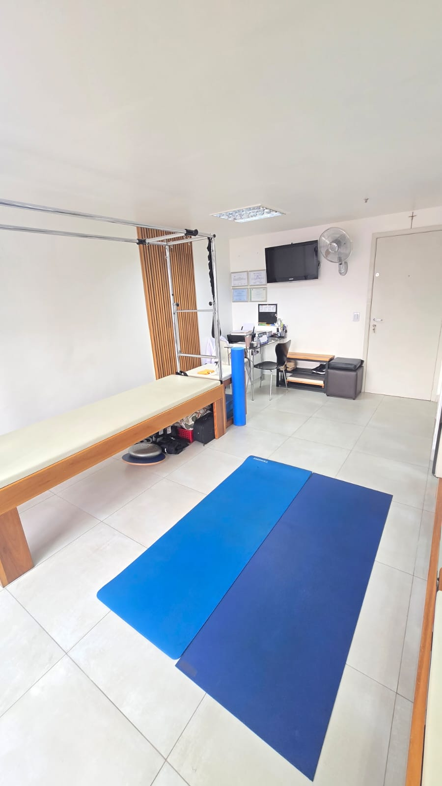 Ambiente de atendimento e Pilates no consultório da Lílian Cunha
